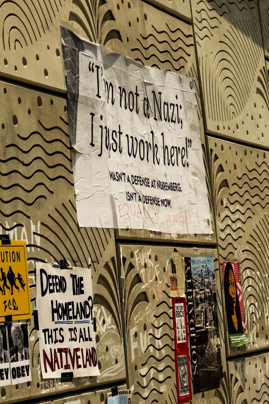 Sign on wall: "I am not a nazi I just work here"