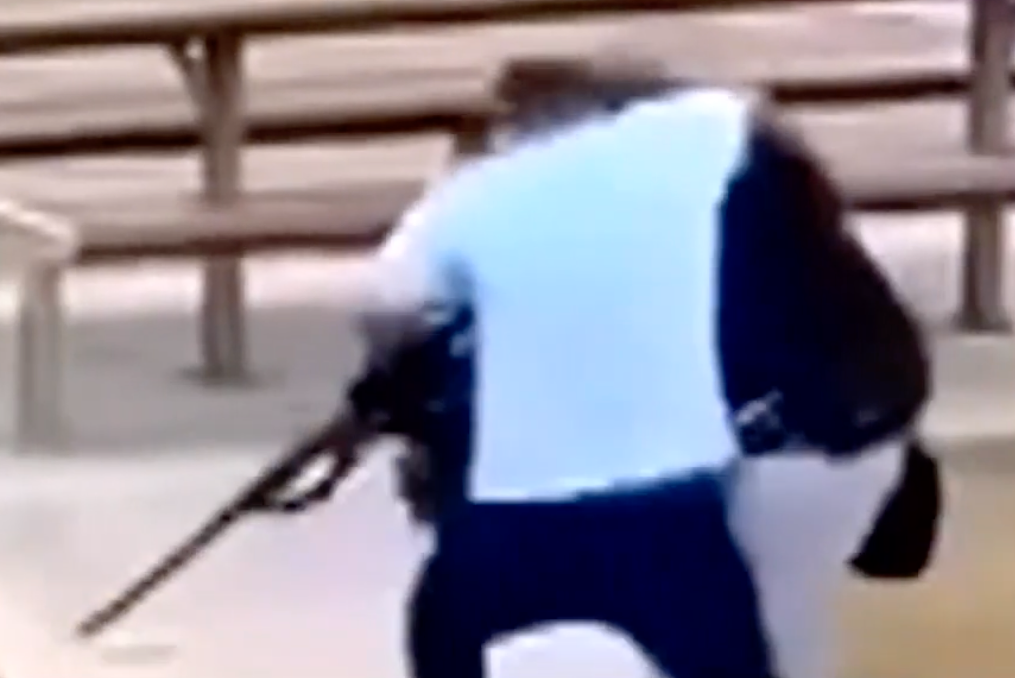 Ahmed Al Ahmed jumps a gunman