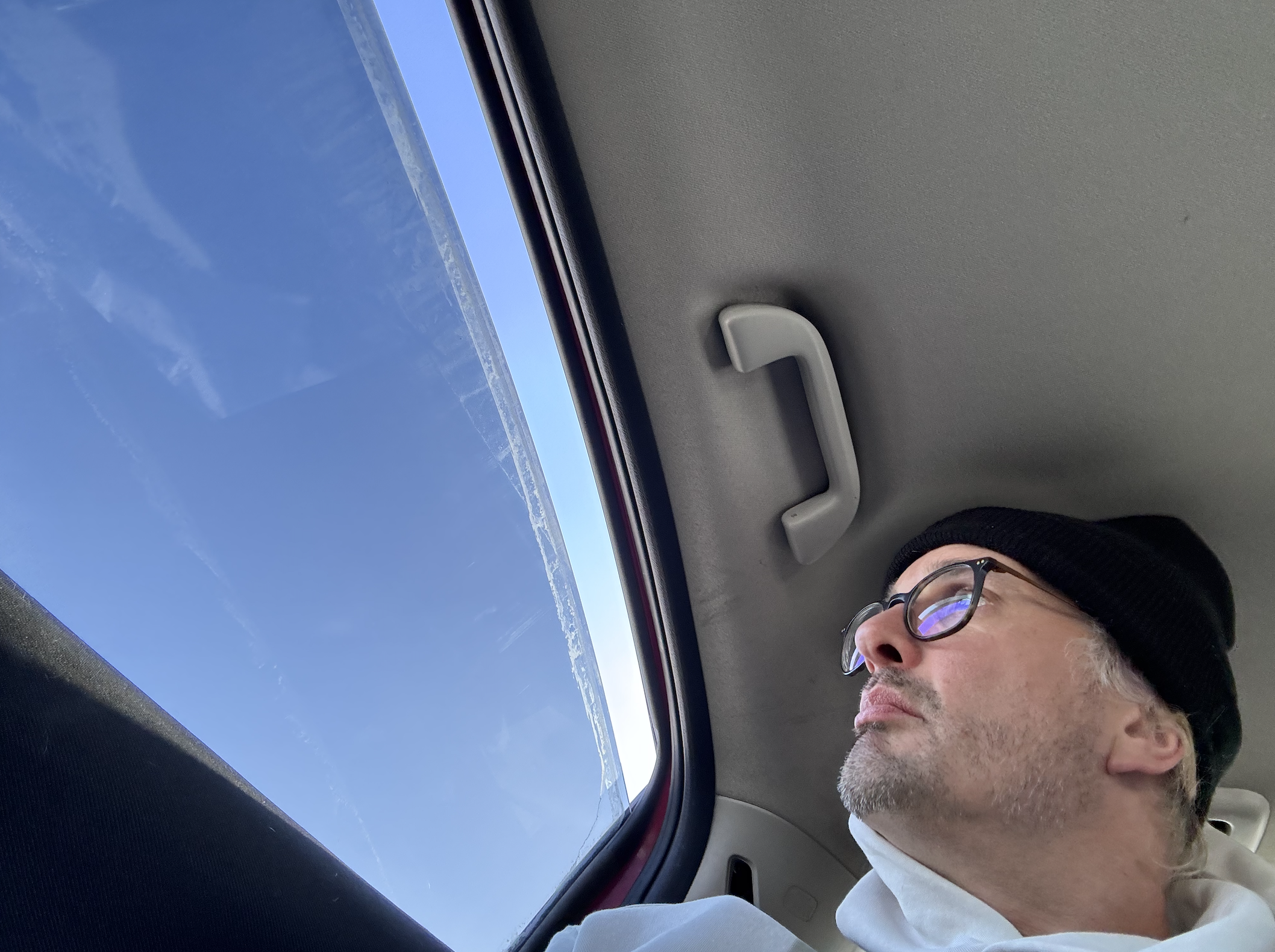 In the back seat of a car