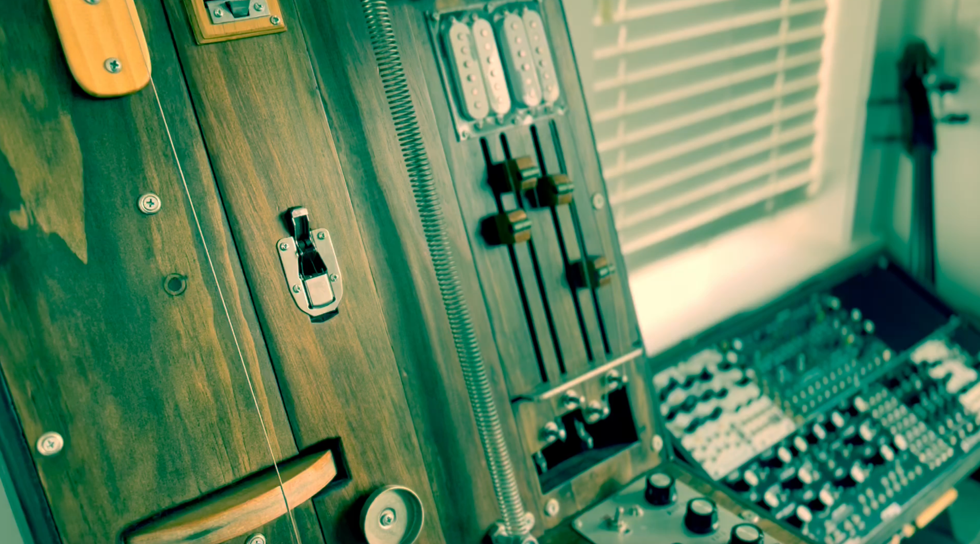 The Clamp - a wooden box with a lot of buttons and built in mechanics to make crazy noises!