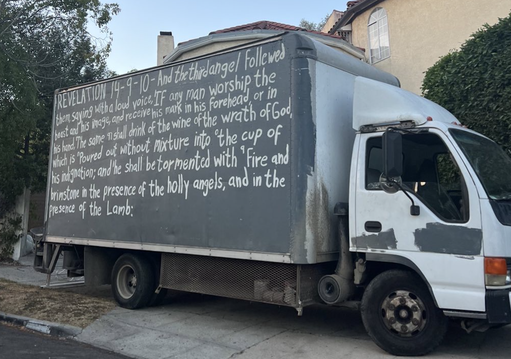 A truck with Rev 14 on it: "AND THE THIRD ANGEL FELLOWED...." & "IN THE PRESENCE OF THE HOLLY ANGELS"