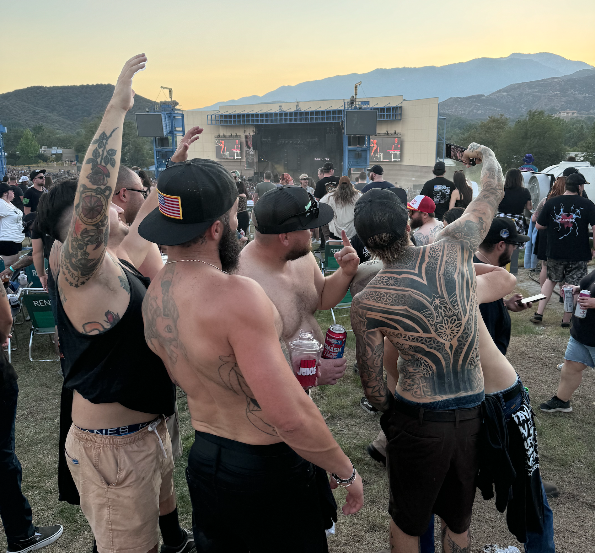 American cap on backwards, no shirt