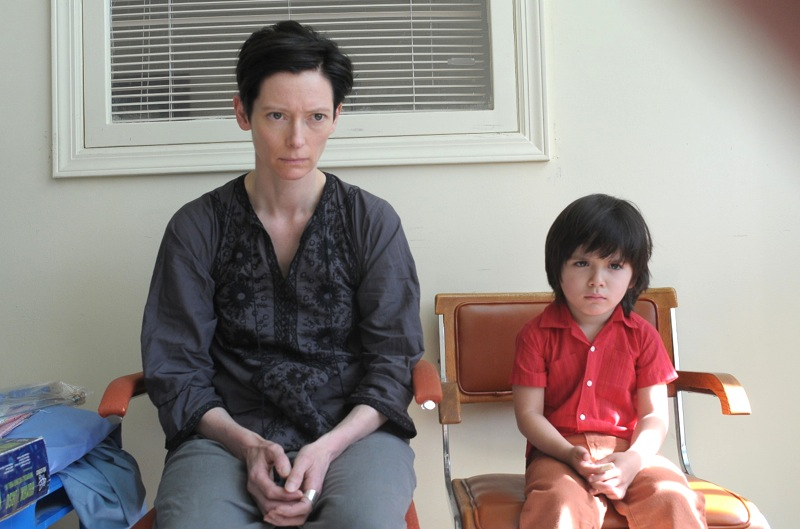 Kevin looking angry while his mom sits there looking annoyed