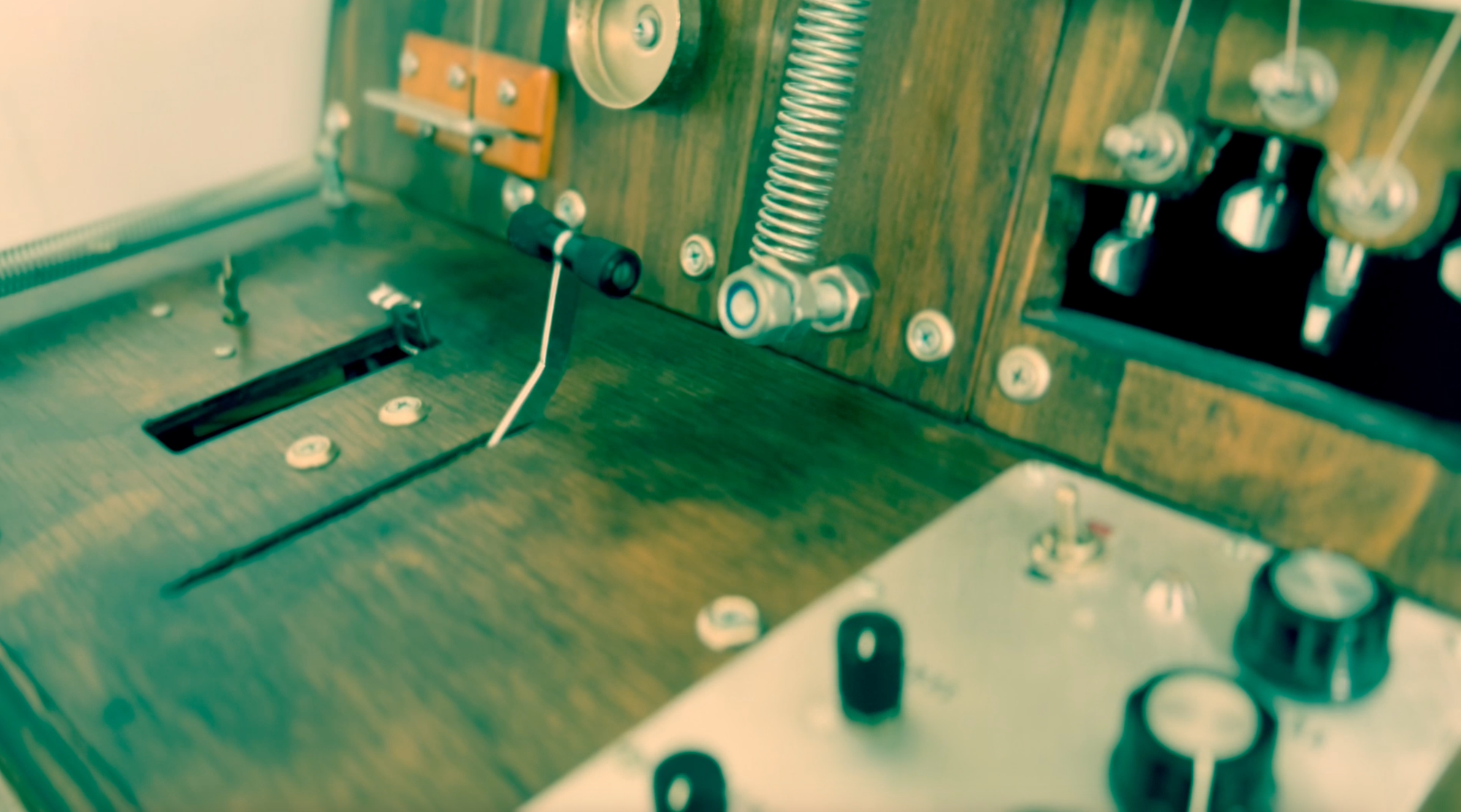 The Clamp - a wooden box with a lot of buttons and built in mechanics to make crazy noises!