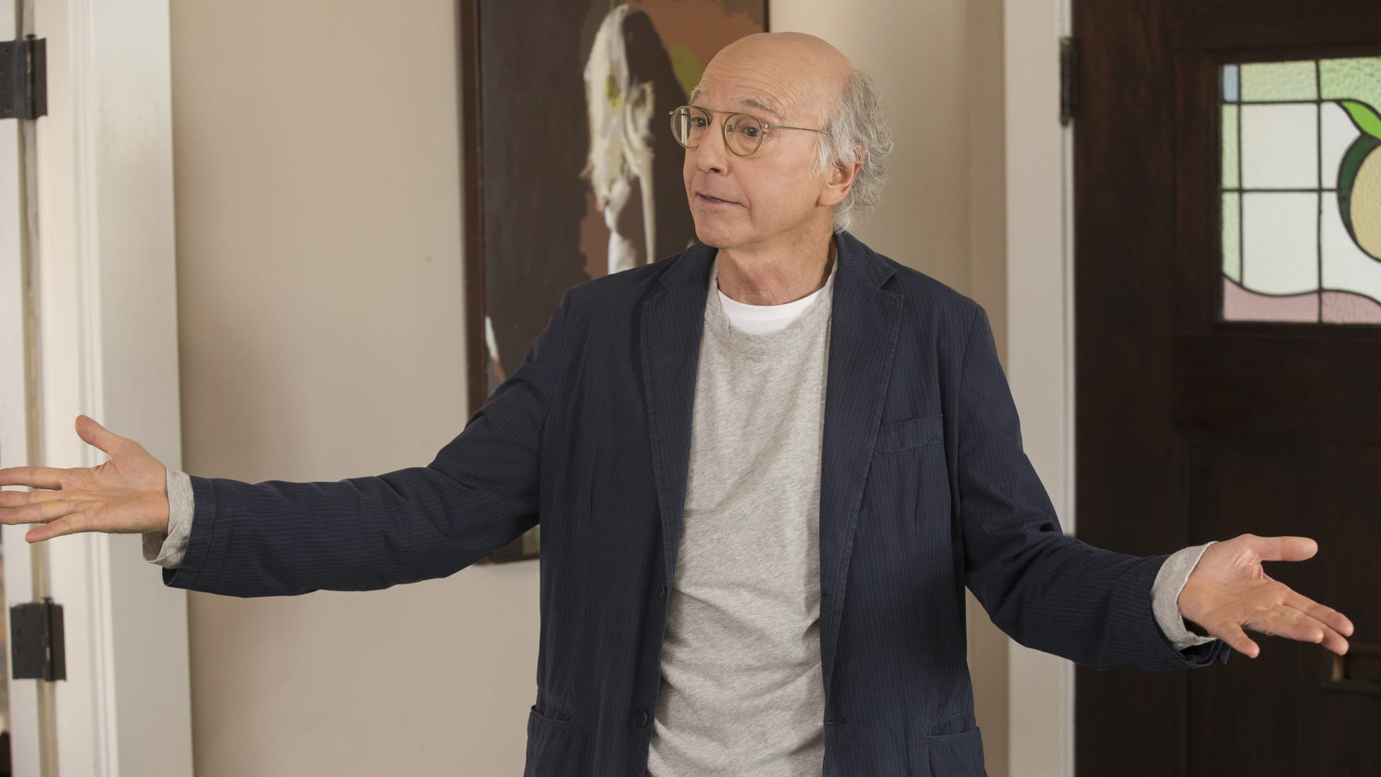 Larry David shrugging in Curb your Enthusiasm scene