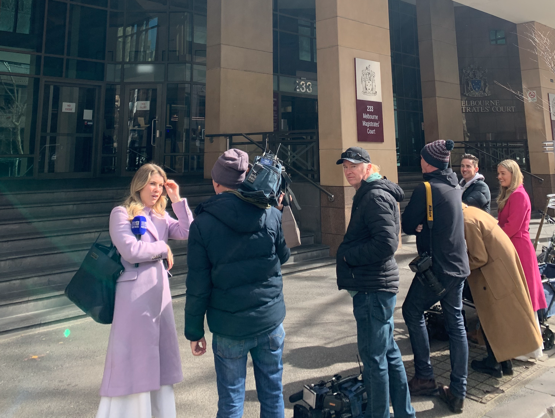 Reporters outside the court