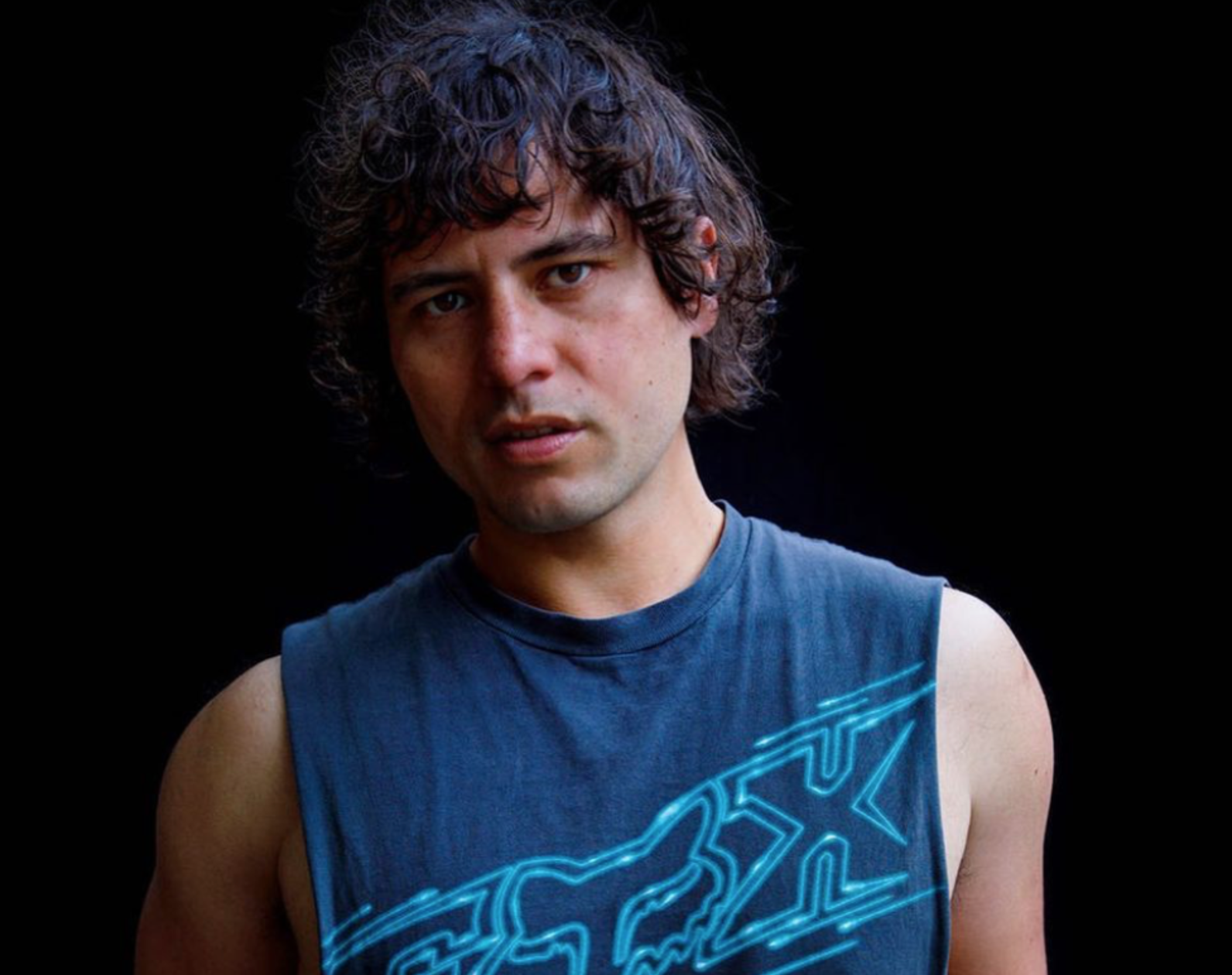 Samuel Te Kani in a cut off top