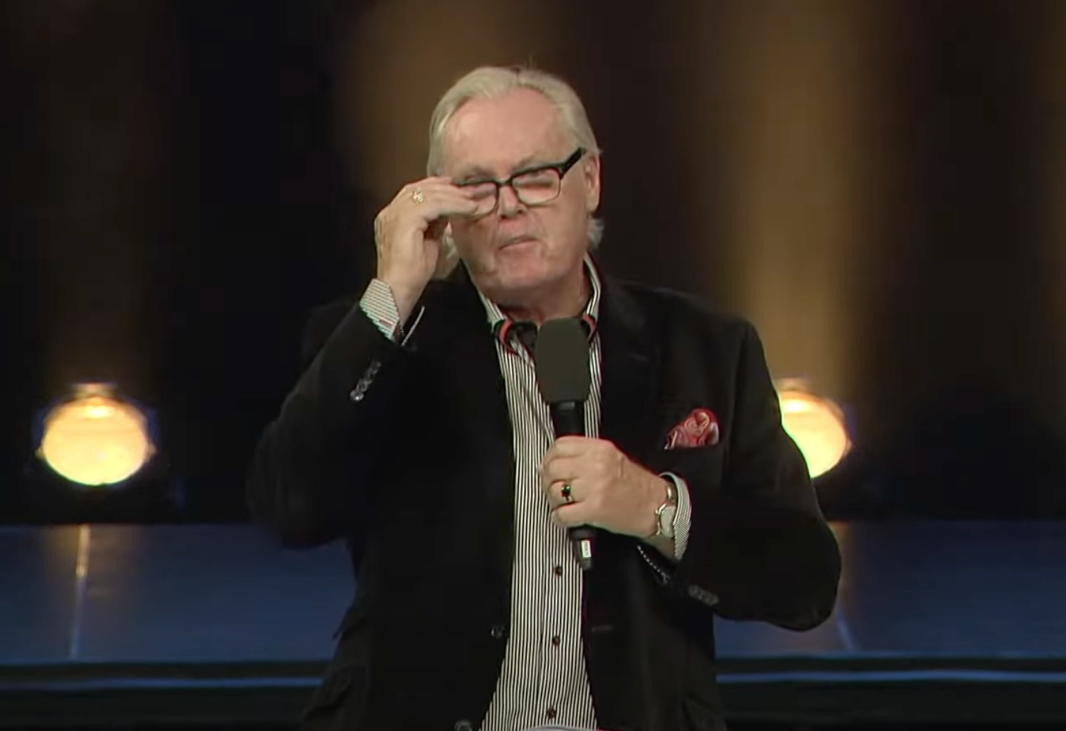 Mortlock on stage giving a sermon at City Impact Church