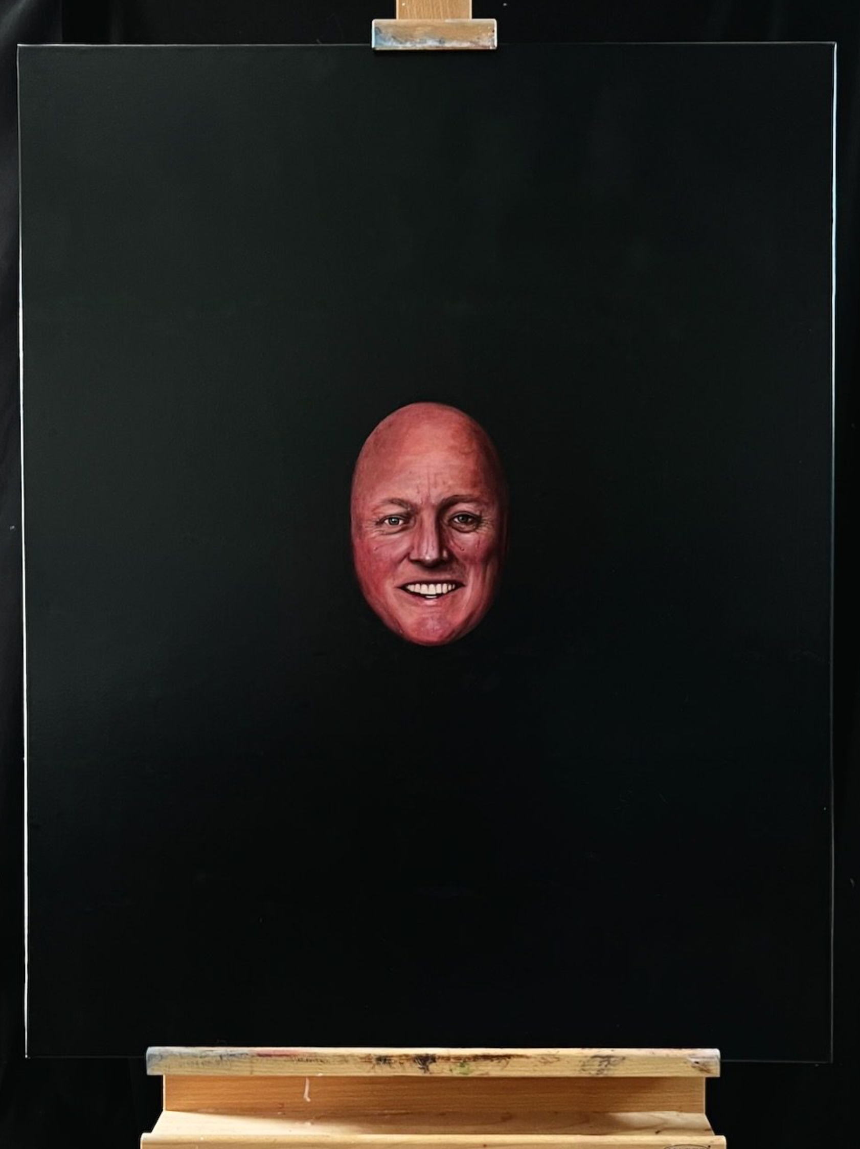 Luxons little sweaty face swimming in a sea of black"