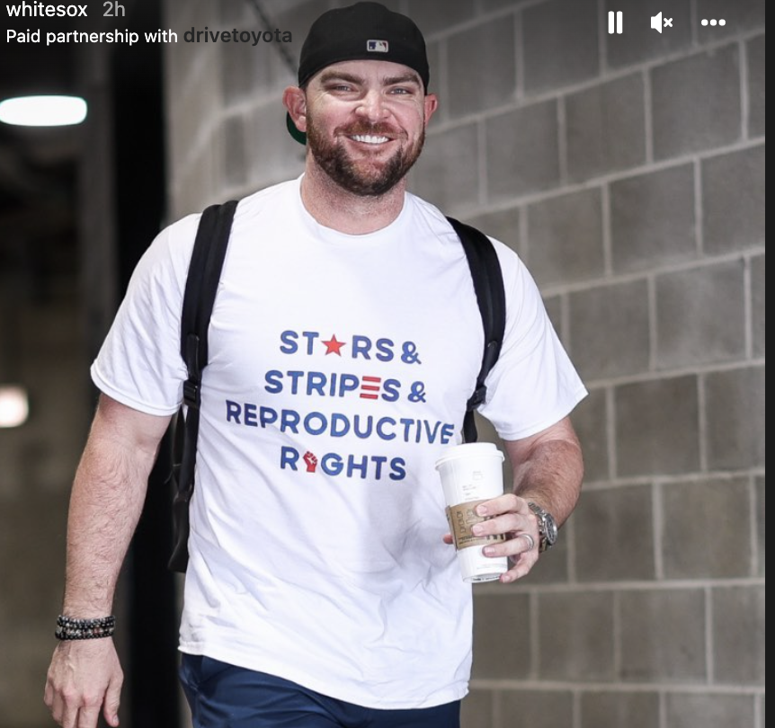 LIam smiling in a shirt that says "STARS AND STRIPES AND REPRODUCTIVE RIGHTS"