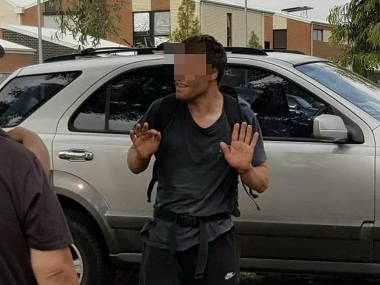 The alleged Fake Seizure Man is confronted by other citizens