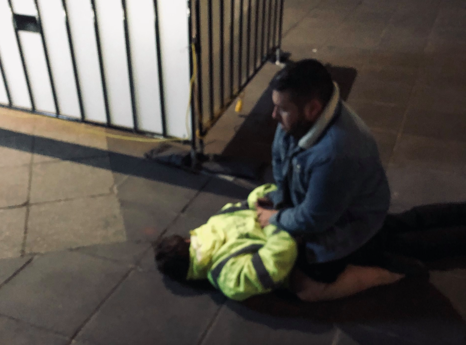 Christian Hull sitting on top of Fake Seizure Guy "like a horse"