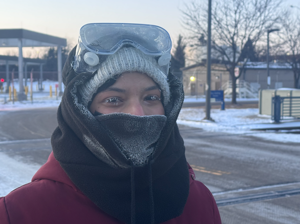 A protestor outside the Whipple building